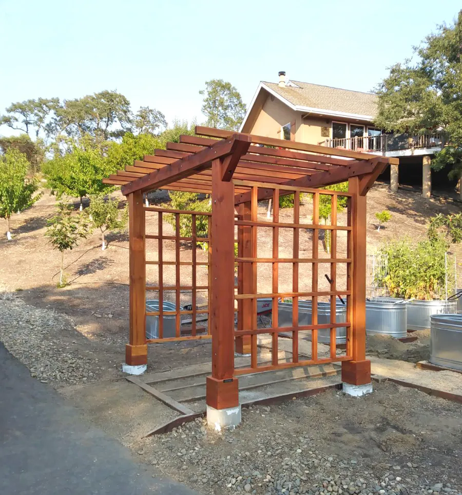 Custom Entryway Arbor (Options: 120" W, 84" D, California Redwood, 4-Post Archor Kit for Concrete, Transparent Premium Sealant) with 6 x 6 Posts and 2 x 6 Rafters by Custom Request. Photo Courtesy of K. Moore of Healdsburg, CA.