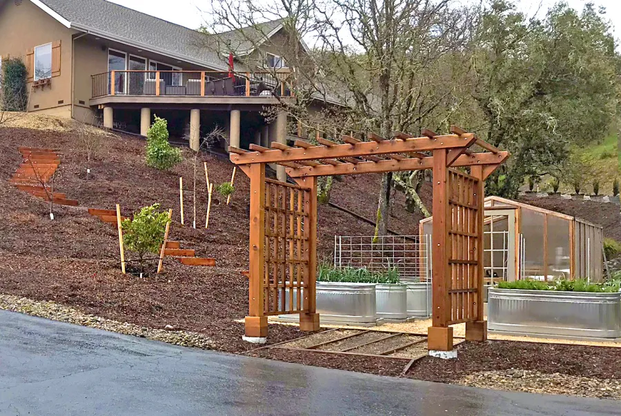 Custom Entryway Arbor (Options: 120" W, 84" D, California Redwood, 4-Post Archor Kit for Concrete, Transparent Premium Sealant) with 6 x 6 Posts and 2 x 6 Rafters by Custom Request. Photo Courtesy of K. Moore of Healdsburg, CA.