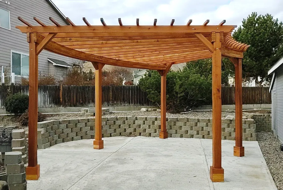 Fan Shaped Pergola Kit (Options: 22' x 20', California Redwood, With Roof Slats, No Electrical Wiring Trim Kit, 5-Post Anchor Kit for Concrete, No Ceiling Fan Base, 9.5' Posts, No Curtain Rods, Transparent Premium Sealant). Photo Courtesy of J. Knuvson of Wenatchee, Washington.