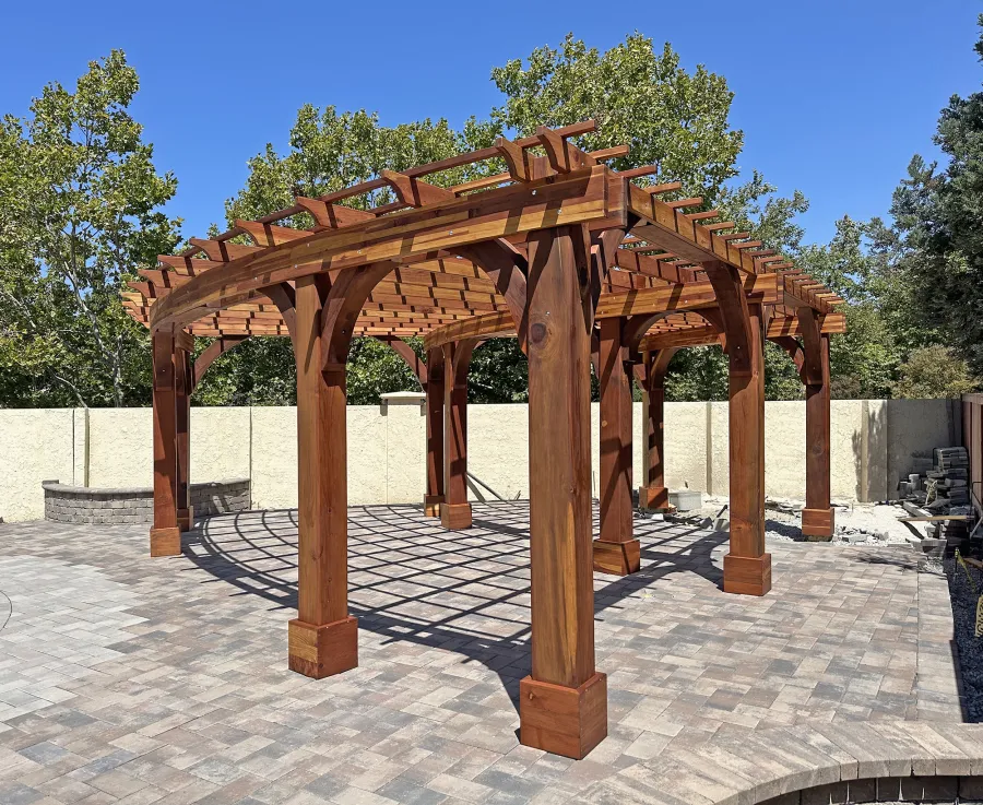 Fan Shaped Pergola Kit (Options: 35' x 16', California Redwood, With Roof Slats, No Electrical Wiring Trim Kit, Post Anchor Kit for High Wind, No Ceiling Fan Base, 10' Posts, No Curtain Rods, Transparent Premium Sealant). Photo Courtesy of R. & M. Gonzalez of Dublin, CA.