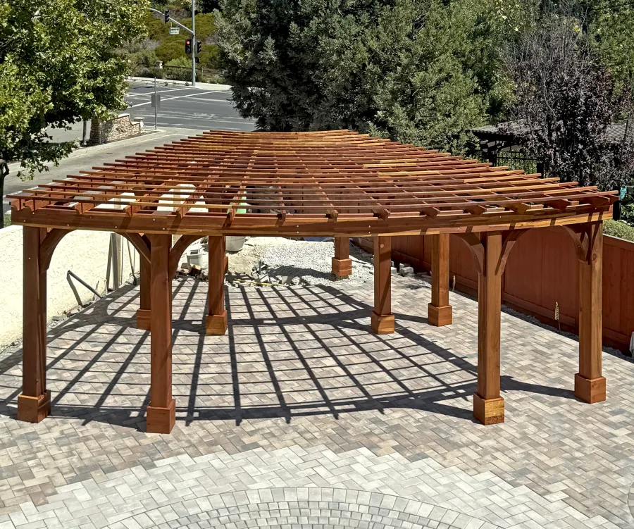 Fan Shaped Pergola Kit (Options: 35' x 16', California Redwood, With Roof Slats, No Electrical Wiring Trim Kit, Post Anchor Kit for High Wind, No Ceiling Fan Base, 10' Posts, No Curtain Rods, Transparent Premium Sealant). Photo Courtesy of R. & M. Gonzalez of Dublin, CA.