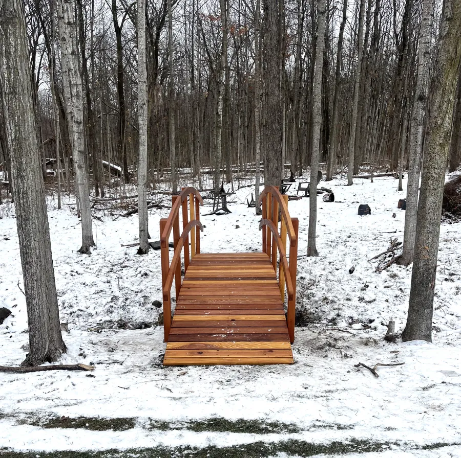 Custom Forever Foot Bridge (Options: 18' L, California Redwood, 4' Width, Transparent Premium Sealant). Photo Courtesy of T. Reyes of St. Charles, IL.