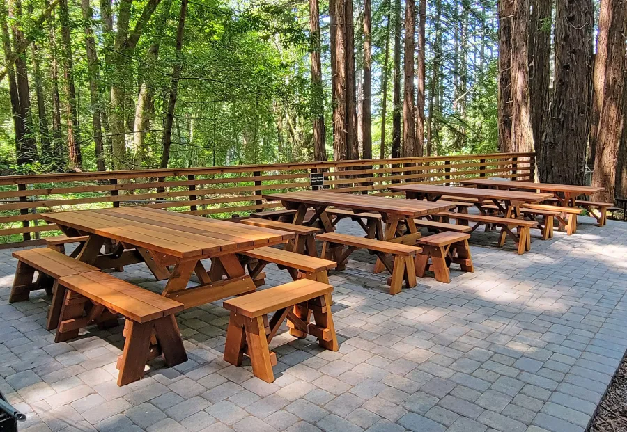Forever Picnic Tables (Unattached Benches) (Options: 8' L, 40 ¼in W, Side Benches & End Benches, Old-Growth Redwood, 2 Half Length Side Bench Per Side, Standard Tabletop, Slightly Rounded Corners, No Umbrella Hole, Transparent Premium Sealant). Photo Courtesy of The Scotts Valley Sportsmen's Club of Scotts Valley, CA.