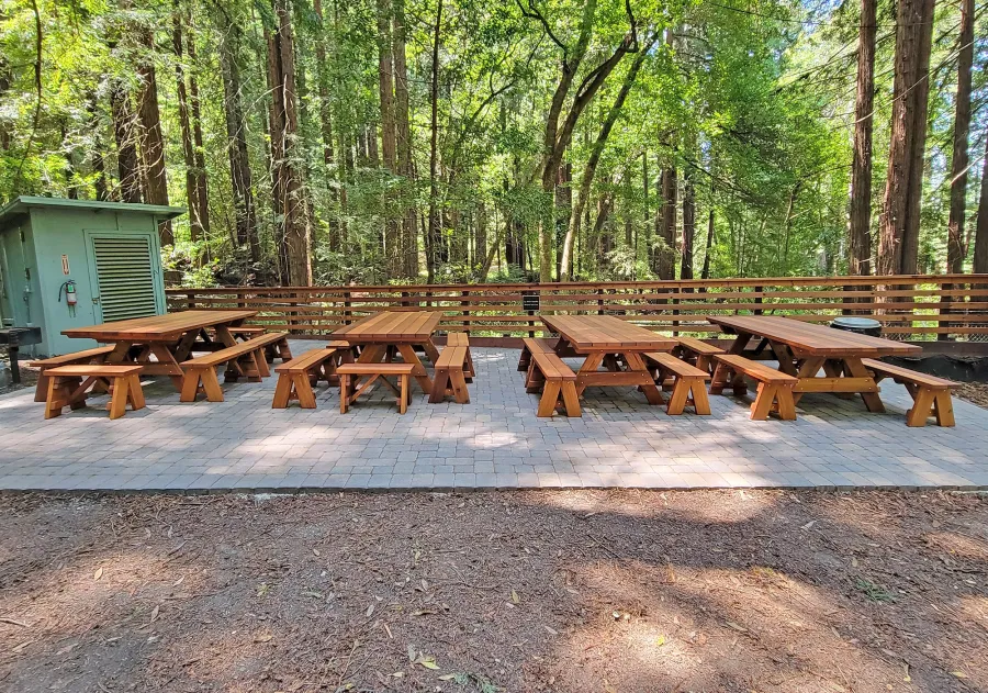 Forever Picnic Tables (Unattached Benches) (Options: 8' L, 40 ¼in W, Side Benches & End Benches, Old-Growth Redwood, 2 Half Length Side Bench Per Side, Standard Tabletop, Slightly Rounded Corners, No Umbrella Hole, Transparent Premium Sealant). Photo Courtesy of The Scotts Valley Sportsmen's Club of Scotts Valley, CA.