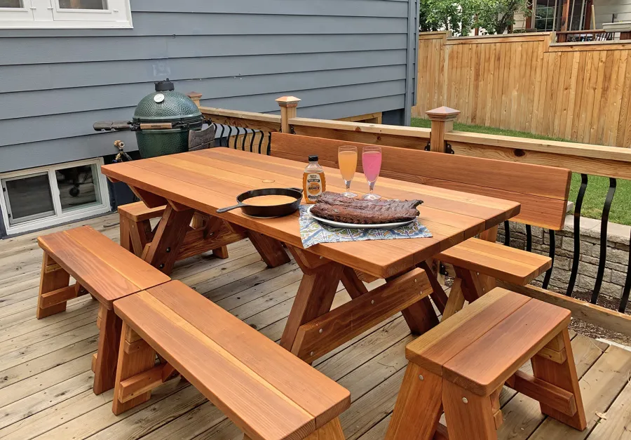 Forever Picnic Table (Unattached Benches) (Options: 7' L, 34 ½in W, Side and End Benches, California Redwood, 1 Full Length Fullback Bench on One Side, and 2 Half Length Picnic Benches on the Other Side, Standard Tabletop, Squared Corners, 2in Diameter Umbrella Hole, Transparent Premium Sealant). Photo Courtesy of I. Miller of Longmont, Colorado.