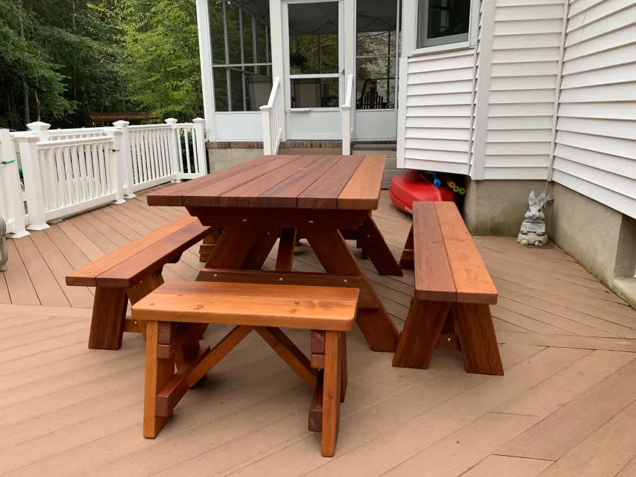 Forever Picnic Table (Unattached Benches) (Options: 6' L, 34 ½in W, Side and End Benches, Old-Growth Redwood, 1 Full Length Bench Per Side, Standard Tabletop, Slightly Rounded Corners, 2in Diameter Umbrella Hole, Transparent Premium Sealant). Photo Courtesy of S. Korotky of Tom's River, New Jersey.