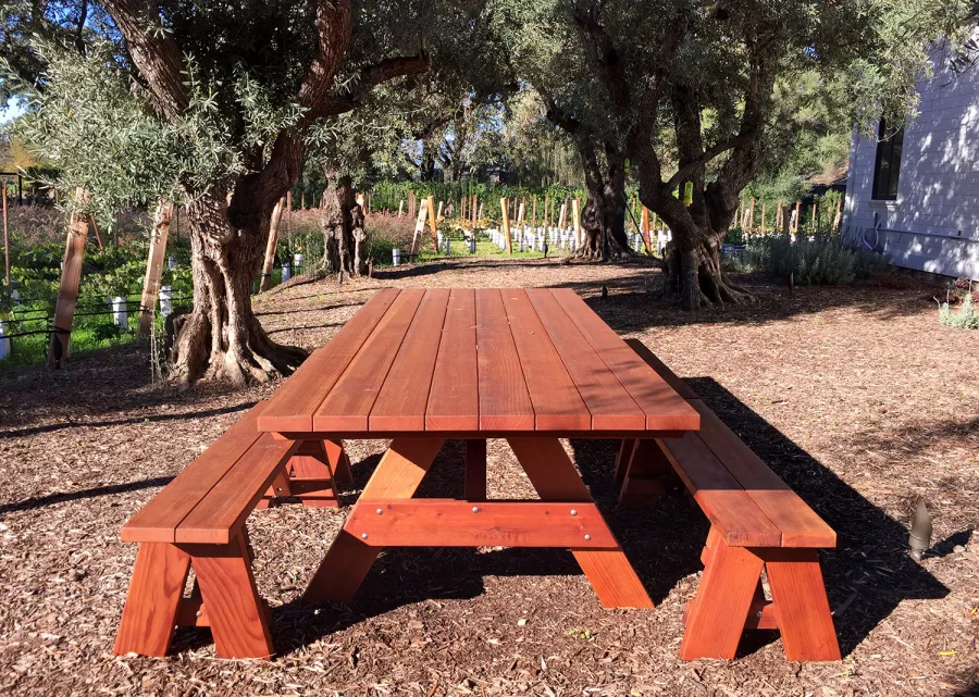 Forever Picnic Tables (Unattached Benches) (Options: 10' L, 46in W, Side Benches, Mature Redwood, 2 Half Length Benches Per Side, Standard Tabletop, Square Corners, 2in Umbrella Hole, Transparent Premium Sealant). Photo Courtesy of H. Williams of Sonoma, CA.