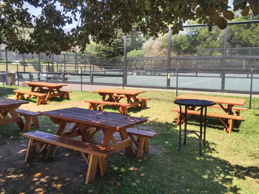 Forever Picnic Tables (Unattached Benches) (Options: 6' L, 34 ½in W, Side Benches, California Redwood, 1 Full Length Side Bench Per Side, Standard Tabletop, Squared Corners, No Umbrella Hole, Transparent Premium Sealant). Photo Courtesy of The Knowlwood Tennis Club of Santa Barbara, CA