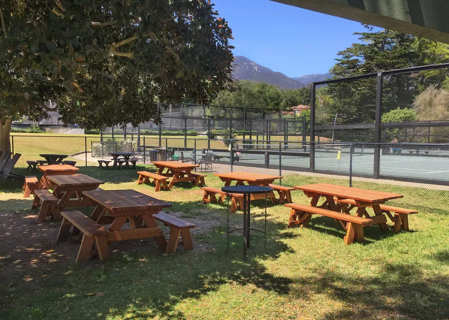 Forever Picnic Tables (Unattached Benches) (Options: 6' L, 34 ½in W, Side Benches, California Redwood, 1 Full Length Side Bench Per Side, Standard Tabletop, Squared Corners, No Umbrella Hole, Transparent Premium Sealant). Photo Courtesy of The Knowlwood Tennis Club of Santa Barbara, CA