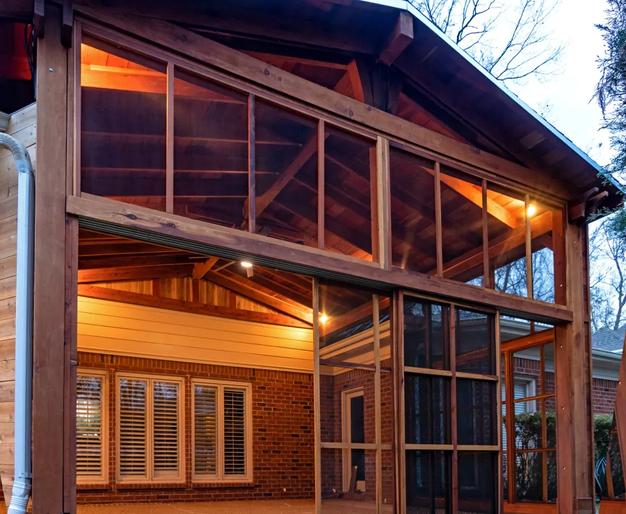 Forever Porch Pavilion (Options: 20' L x 20'-9" W, California Redwood, 2-Post Anchor Kit for High-Wind, No Electrical Wiring Trim, with 2 Fascia Boards for Gutters, 12 ft Posts Height, No Post Decorative Trims, 1 Ceiling Fan Base, No Curtain Rods, with Privacy Panels, Screened Sliding Doors and Fixed Screen Panels, Transparent Premium Sealant). Photo Courtesy of J. Pegg of Cordova, TN.