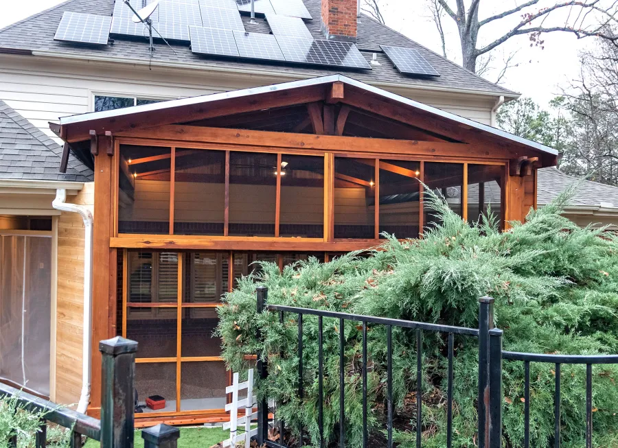 Forever Porch Pavilion (Options: 20' L x 20'-9" W, California Redwood, 2-Post Anchor Kit for High-Wind, No Electrical Wiring Trim, with 2 Fascia Boards for Gutters, 12 ft Posts Height, No Post Decorative Trims, 1 Ceiling Fan Base, No Curtain Rods, with Privacy Panels, Screened Sliding Doors and Fixed Screen Panels, Transparent Premium Sealant). Photo Courtesy of J. Pegg of Cordova, TN.