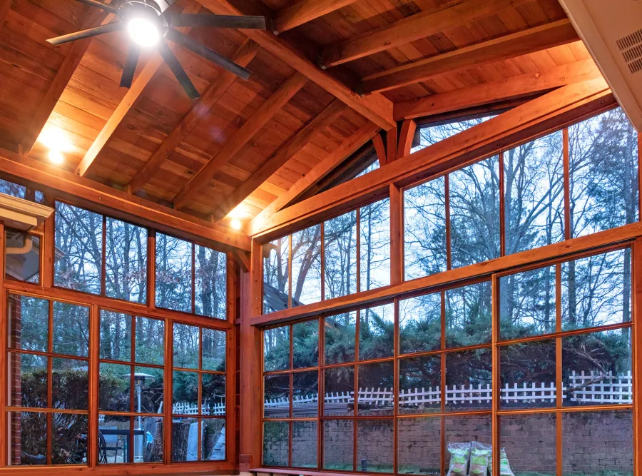 Forever Porch Pavilion (Options: 20' L x 20'-9" W, California Redwood, 2-Post Anchor Kit for High-Wind, No Electrical Wiring Trim, with 2 Fascia Boards for Gutters, 12 ft Posts Height, No Post Decorative Trims, 1 Ceiling Fan Base, No Curtain Rods, with Privacy Panels, Screened Sliding Doors and Fixed Screen Panels, Transparent Premium Sealant). Photo Courtesy of J. Pegg of Cordova, TN.