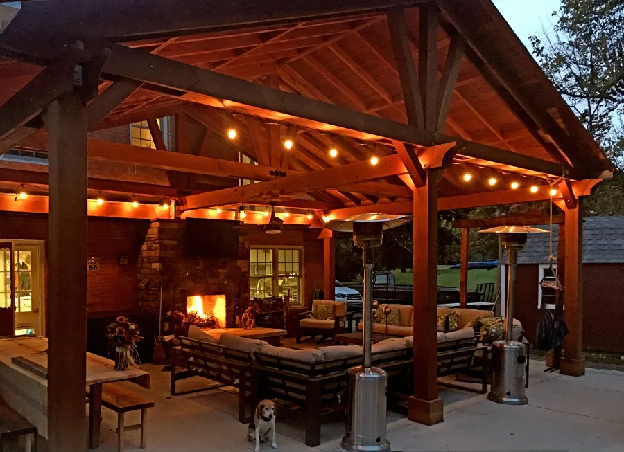 Custom Forever Porch Pavilion (Options: 30' L x 22' W, Douglas-fir, 5-Post Anchor Kit for Concrete, 1 Ceiling Fan Base, Transparent Premium Sealant). Because of the depth of the pavilion, posts up against the house were used for structural reasons. Photo Courtesy of A. Offutt of New Albany, Indiana.