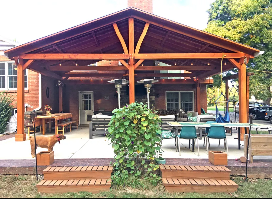 Custom Forever Porch Pavilion (Options: 30' L x 22' W, Douglas-fir, 5-Post Anchor Kit for Concrete, 1 Ceiling Fan Base, Transparent Premium Sealant). Because of the depth of the pavilion, posts up against the house were used for structural reasons. Photo Courtesy of A. Offutt of New Albany, Indiana.
