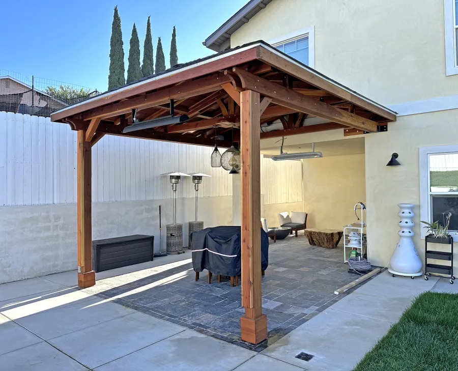 Custom Forever Porch Pavilion (Options: Hip Roof by Custom Request, 15' L x 15' W, California Redwood, 2-Post Anchor Kit for High-Wind, with 2 Electrical Wiring Trims, 10.5ft Posts Height, 1 Ceiling Fan Base, No Curtain Rods, No Privacy Panels, Transparent Premium Sealant). Photo Courtesy of W. Zhang of Thousand Oaks, CA.
