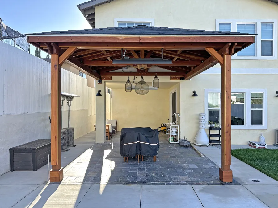 Custom Forever Porch Pavilion (Options: Hip Roof by Custom Request, 15' L x 15' W, California Redwood, 2-Post Anchor Kit for High-Wind, with 2 Electrical Wiring Trims, 10.5ft Posts Height, 1 Ceiling Fan Base, No Curtain Rods, No Privacy Panels, Transparent Premium Sealant). Photo Courtesy of W. Zhang of Thousand Oaks, CA.