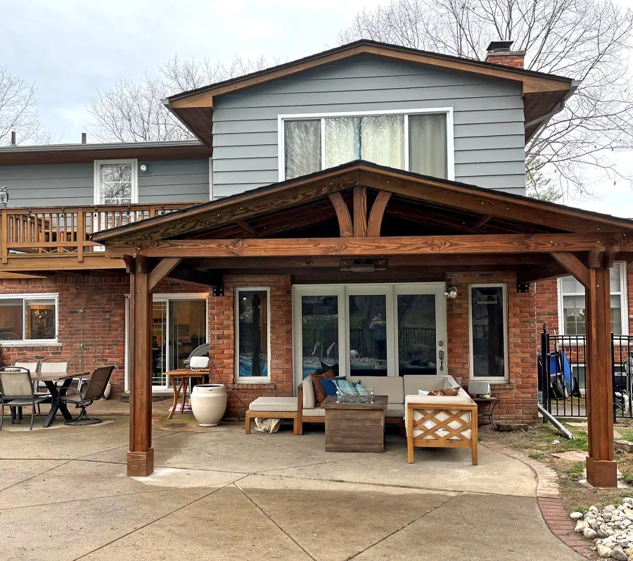 Forever Porch Pavilion (Options: 18' L x 12' W, Douglas-fir, 2-Post Anchor Kit for High-Wind, No Electrical Wiring Trim, 8.5 ft Posts Height, Vertical Post Decorative Trims, No Ceiling Fan Base, No Curtain Rods, No Privacy Panels, Transparent Premium Sealant). Photo Taken 1 Year After Installation. Photo Courtesy of C. Mellanby of West Bloomfield, Michigan.