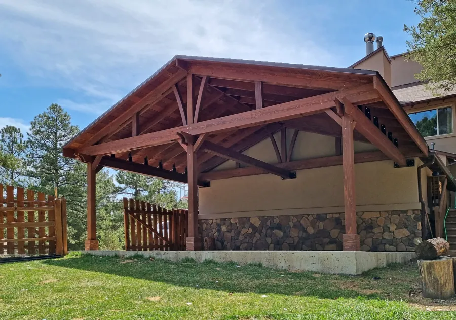 Forever Porch Pavilion (Options: 26' L x 15' W, California Redwood, 3-Post Anchor Kit for High-Wind, No Electrical Wiring Trim, 9 ft Posts Height, 2 Fascia Boards, No Post Decorative Trims, No Ceiling Fan Base, No Curtain Rods, No Privacy Panels, Coffee-Stain Premium Sealant). Photo Courtesy of R. Hoban of Evergreen, CO.