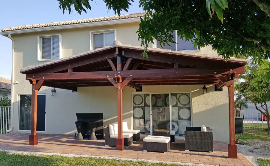 Forever Porch Pavilion (Options: 12' L x 25' W, California Redwood, 3-Post Anchor Kit for High-Wind, No Electrical Wiring Trim, 9ft Posts Height, No Ceiling Fan Base, No Curtain Rods, No Privacy Panels, Transparent Premium Sealant). Photo Courtesy of Carol Varela of Florida.