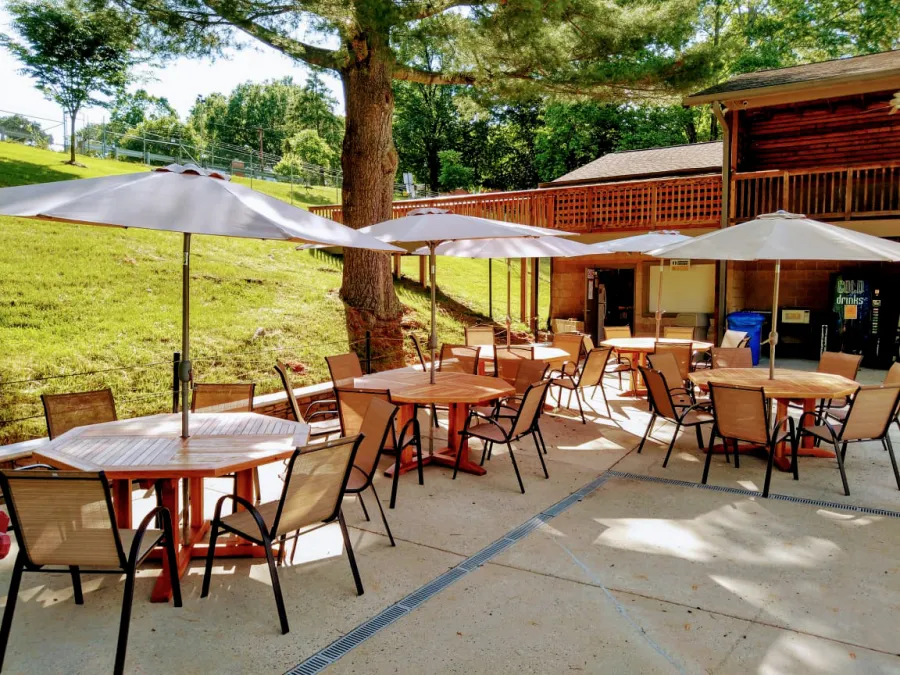 Helen's Octagonal Terrace Tables (Options: 5 ft, No Seating, California Redwood, Standard Tabletop, Rounded Corners, Umbrella Hole, Transparent Premium Sealant). Photo Courtesy of D. Flanigan of Silver Spring, Maryland.