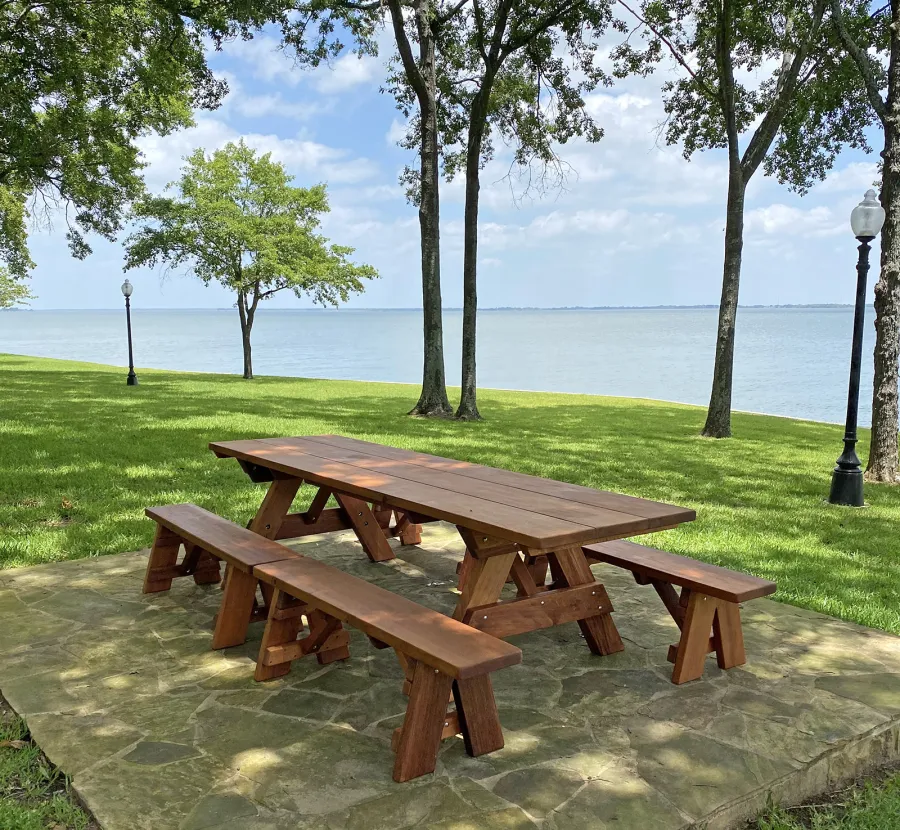 Heritage Large Wooden Picnic Table (Options: 10' L, 36" W, Side Benches, Unattached Benches, 2 Half Length Benches Per Side, Standard Tabletop, Slightly Rounded Corners, No Umbrella Hole, Transparent Premium Sealant). Photo Courtesy of J. Long of Carrollton, Texas.
