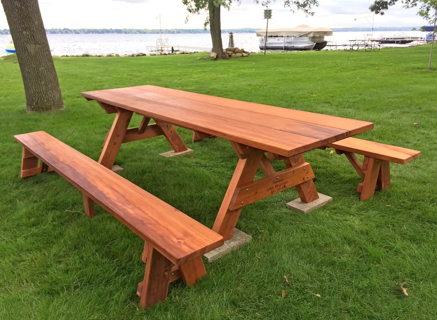 Heritage Large Wooden Picnic Table (Options: 10' L, 34 1/2" W, Side Benches, Unattached Benches, 1 Full Length Side Bench/Side, Standard Tabletop, Squared Corners, No Umbrella Hole, Transparent Premium Sealant). Engraving by Custom Request. Photo Courtesy of A. Perdue of Stoughton, WI.