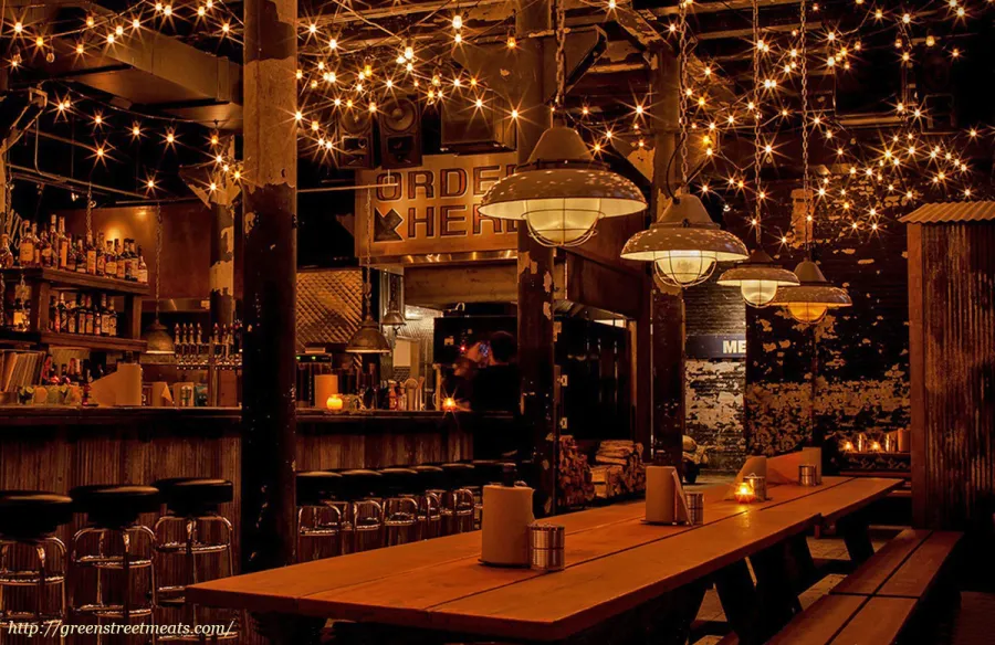 Heritage Large Wooden Picnic Table at ''Green Street Smoked Meats'' Restaurant, 112 N Green St, Chicago, IL 60607 (Options: Several Sizes, 34 1/2'' W, Unattached Side Benches, Transparent Premium Sealant). Photo Courtesy of Jennifer Whang of Chicago, Illinois.