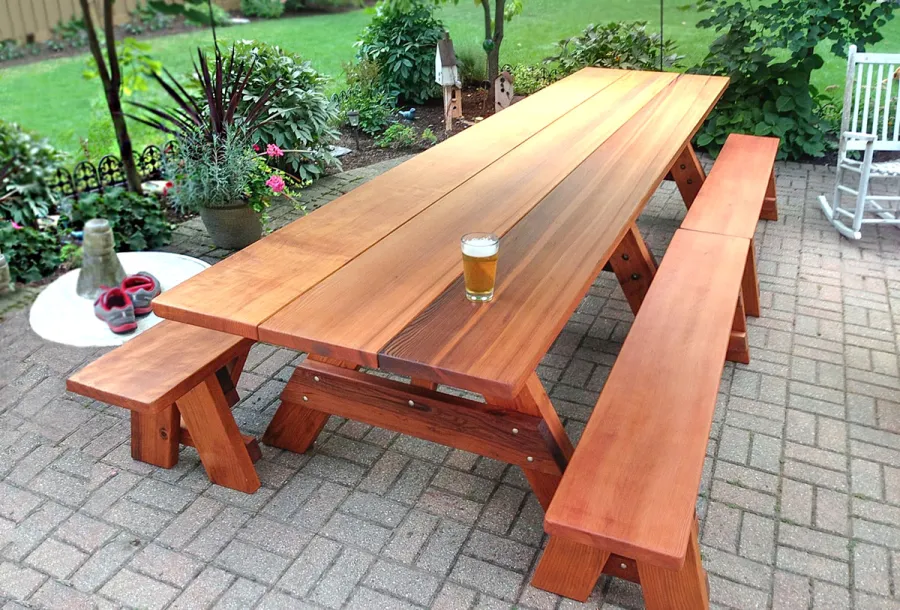 Heritage Large Wooden Picnic Table (Options: 12' L, 34 1/2" W, Side Benches, 2 Half Length Side Benches/Side, Classic Forever Benches, Standard Tabletop, Slightly Rounded Corners, Standard Leg Flair, No Umbrella Hole, Transparent Premium Sealant). Photo Courtesy of Pat Meyer of River Forest, Illinois