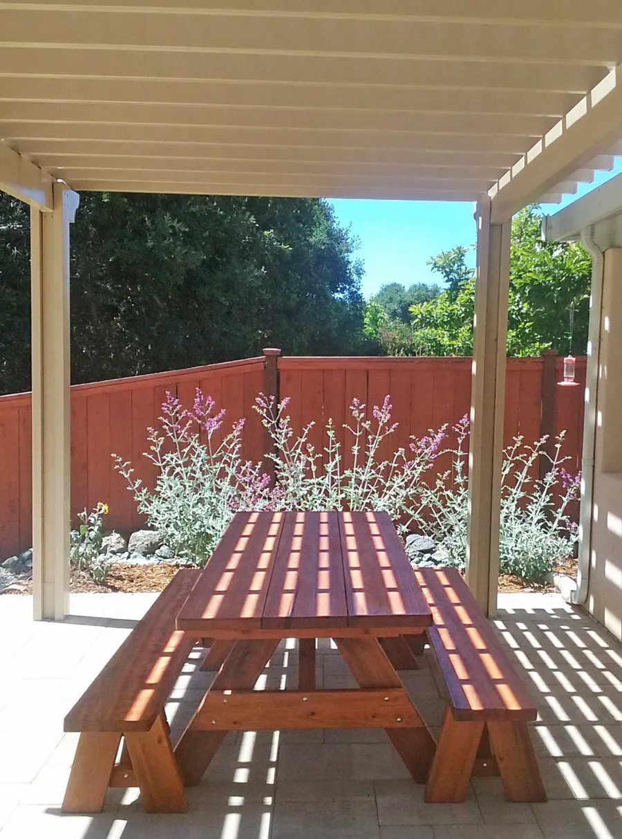 Heritage Large Wooden Picnic Table (Options: 8' L, 34 1/2" W, Side Benches, Unattached Benches, 1 Full Length Side Bench/Side, Forever Style Benches, Standard Tabletop, Slightly Rounded Corners, Standard Leg Flair, No Umbrella Hole, Transparent Premium Sealant). Photo Courtesy of T.Jacobi of San Luis Obispo, CA.