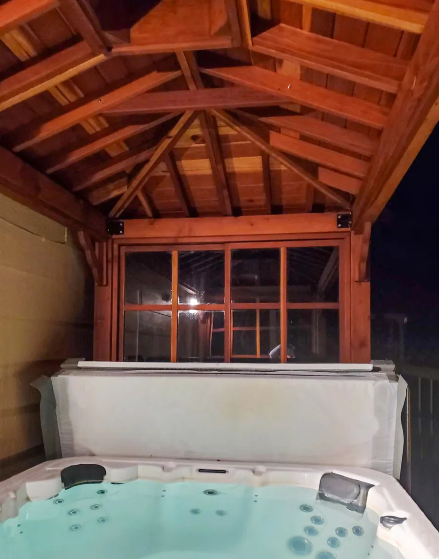 Hot Tub Enclosure Kits / Hot Tub Pavilion (Options: 14' x 7', California Redwood, Windows on 2 sides, 36" H Windows Clearance, 4-Post Kit for Concrete, Transparent Premium Sealant). Photo Courtesy of E. Dudek of Saint Paul, Minnesota.
