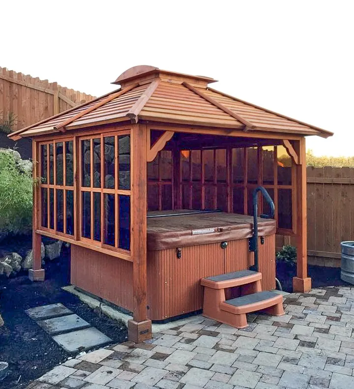 Hot Tub Enclosure Kits / Hot Tub Pavilion (Options: 9' x 9', Mature Redwood, Windows on 3 Sides, 4-Post Anchor Kit for Concrete, Transparent Premium Sealant). Photo Courtesy of Lauren Bode of Ridgefield, Washington. Order was installed by Forever Redwood.