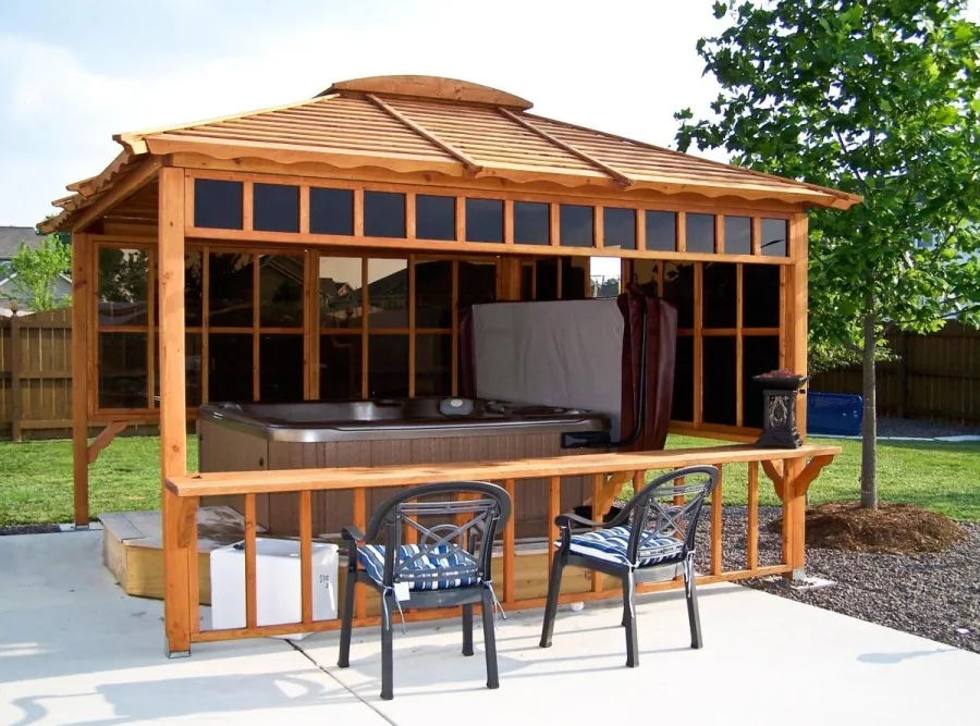 Hot Tub Enclosure Kits / Hot Tub Pavilion (Options: 10' x 10', California Redwood, Windows on 2 Sides, No Curtain Rods, 4-Post Anchor Kit for Stone, Transparent Premium Sealant). Window Bar is a Custom Request. Photo Courtesy of Sherry L. of Smithton, IL. 