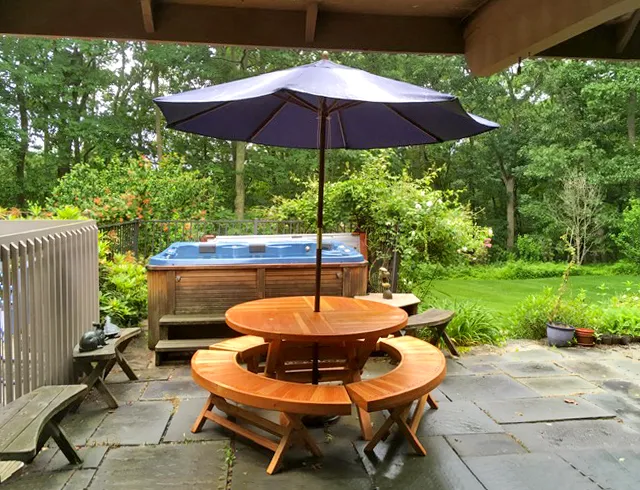 Karyn's Redwood Round Folding Picnic Tablee (Options: Douglas-fir, 3 Arc Folding Benches, Standard Tabletop, Checkerboard Design Tabletop, 1 5/8" Umbrella Hole, Transparent Premium Sealant). Photo Courtesy of A. McCauley of Guilford, Connecticut.