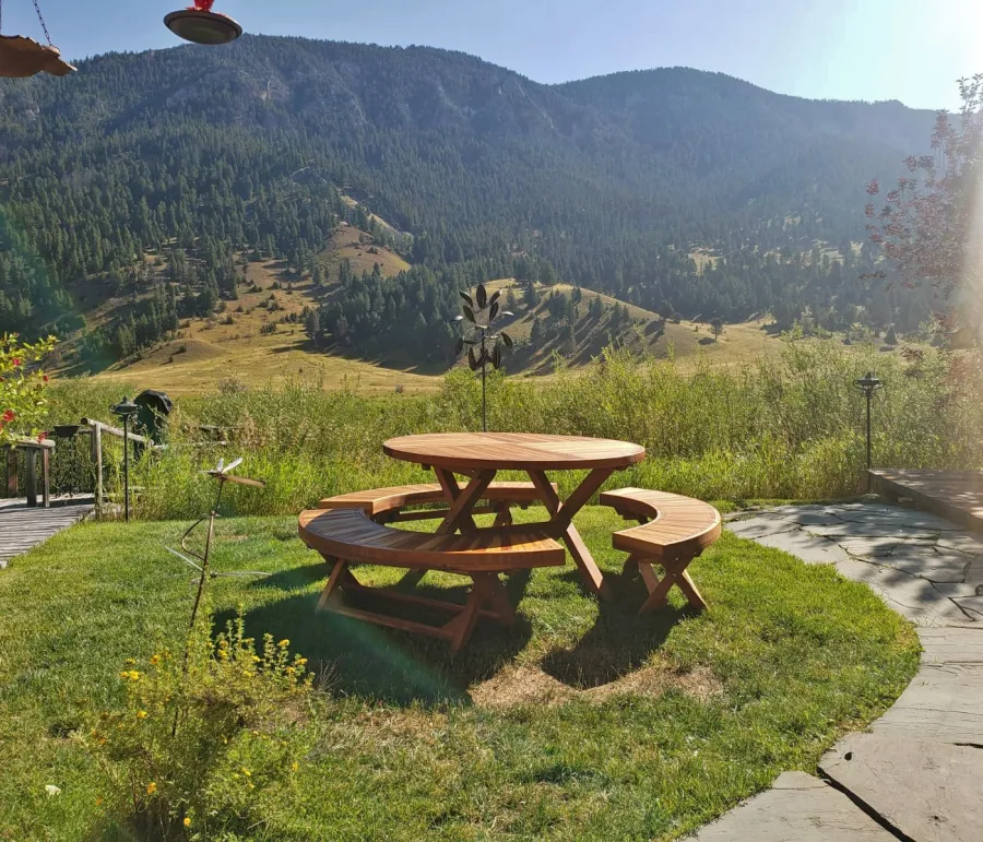 Karyn's Redwood Round Folding Picnic Table (Options: Arc Picnic Benches, California Redwood, 3 Arc Folding Benches, Standard Tabletop, Checkerboard, No Umbrella Hole, Transparent Premium Sealant). Photo Courtesy of B. Korth of Gallatin Gateway, MT.