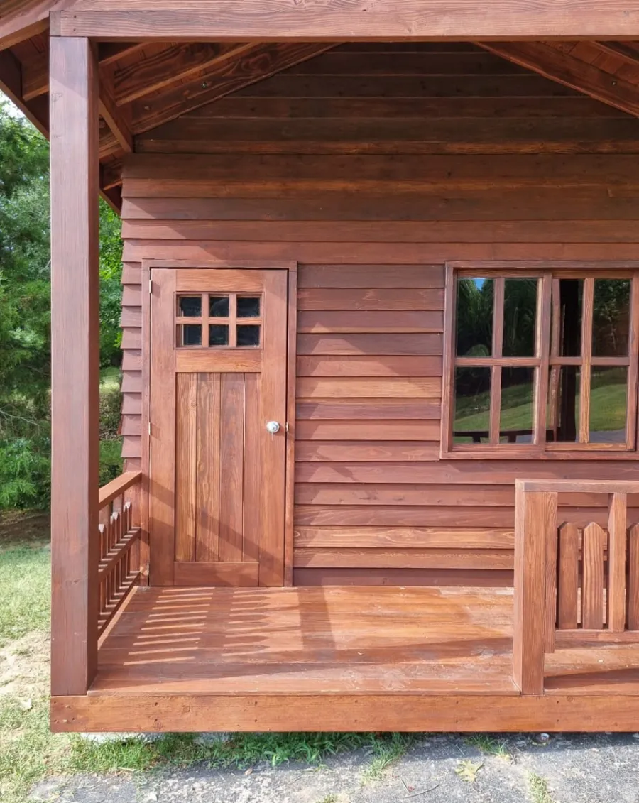 Kid's Backyard Cabin (Options: 14ft L x 10ft W, 8ft Wall H, Douglas-fir [Exterior Siding & Roofing in California Redwood by Custom Request], 4ft Front Porch Size [Included in the Overall Length], Interior Tongue & Groove Flooring, Shiplap Roof, Coffee-Stain Premium Sealant). Photo Courtesy of T. ONeill of Kimberling City, MO.