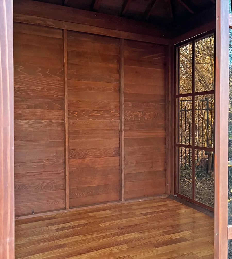 Kikue's Tea House (Options: 10 ft L x 10 ft W, Mature Redwood, with a Wood Handle, No Deck, Coffee-Stain Premium Sealant). Photo Courtesy of E. Monser of Ladue, Missouri. Pergo Flooring Shown is a Custom Item Installed After Delivery.