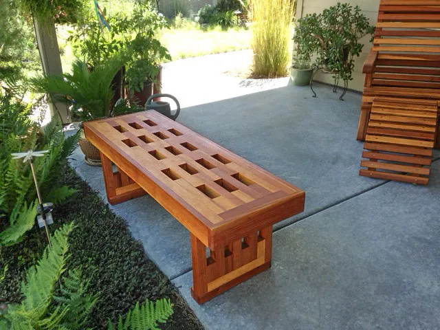 Lighthouse Garden Bench (Options: 4 1/2 ft L x 10 3/4 inches W x 12.5 inches H, California Redwood, No Cushion, No Engraving, Transparent Premium Sealant). Photo courtesy of Marilyn Brooks of Star, Idaho. 