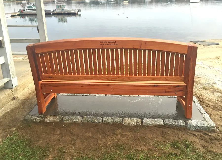 Luna Wood Memorial Bench (Options: 6 ft, Old-Growth Redwood, No Cushion, Custom Engraving, Transparent Premium Sealant). Photo Courtesy of Bob C. of Marion, Massachusetts.