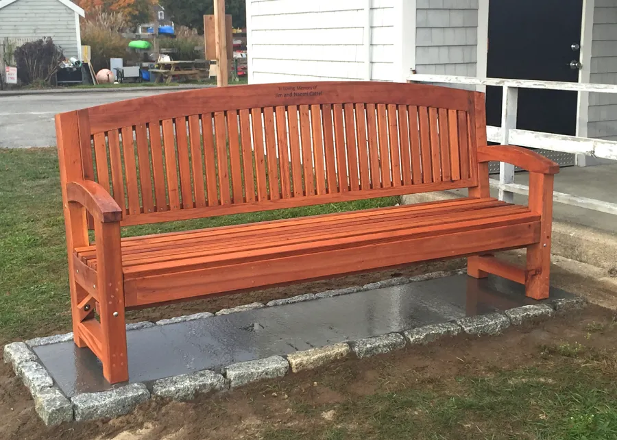 Luna Wood Memorial Bench (Options: 6 ft, Old-Growth Redwood, No Cushion, Custom Engraving, Transparent Premium Sealant). Photo Courtesy of Bob C. of Marion, Massachusetts.