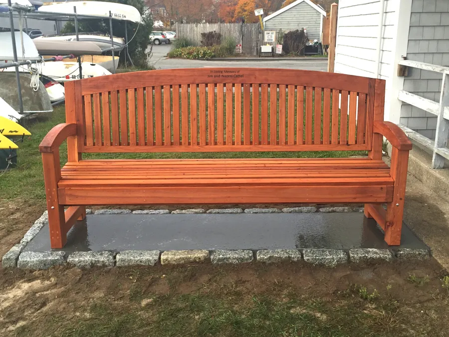 Luna Wood Memorial Bench (Options: 6 ft, Old-Growth Redwood, No Cushion, Custom Engraving, Transparent Premium Sealant). Photo Courtesy of Bob C. of Marion, Massachusetts.