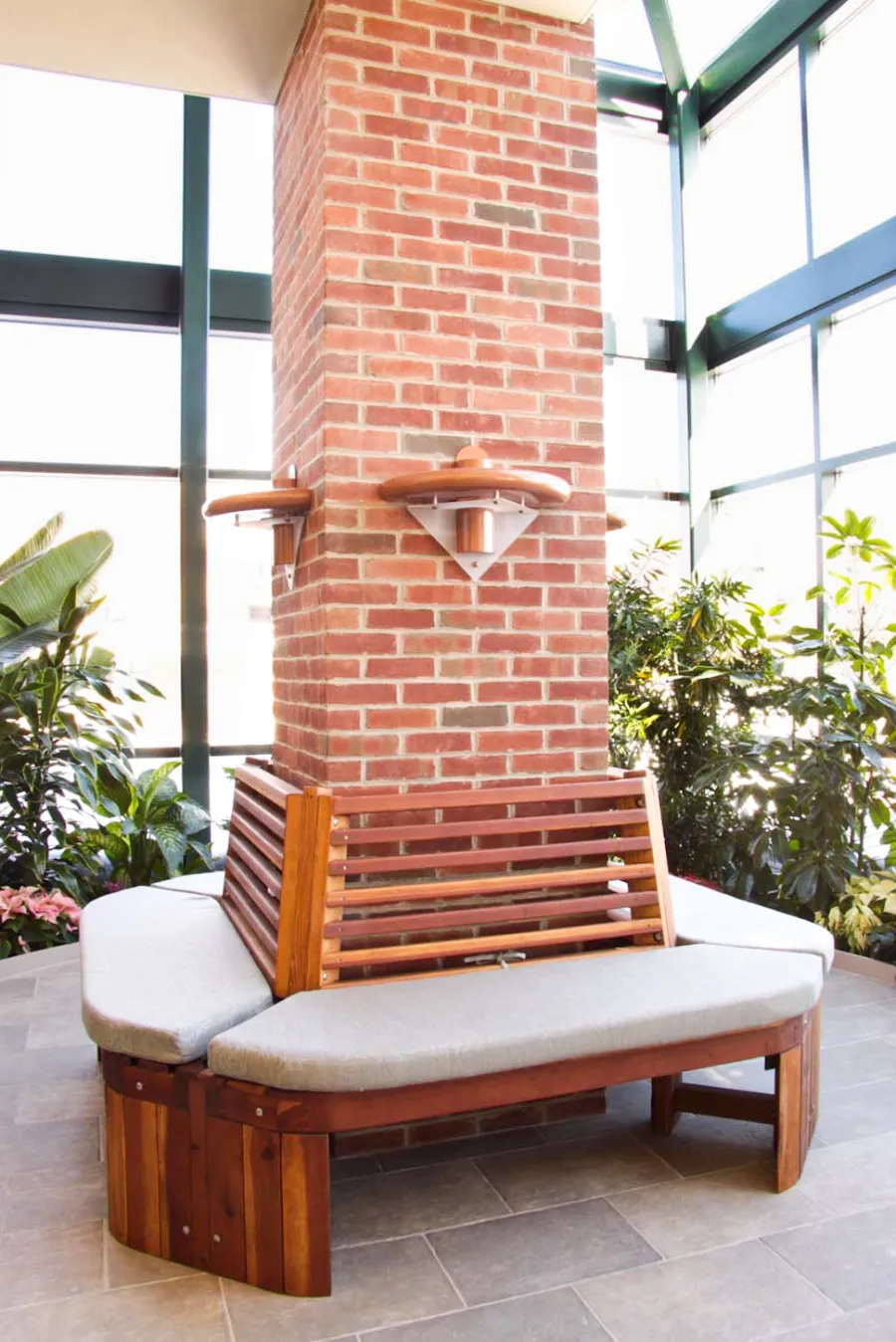 Maria's Tree Benches (Options: 6 1/2', California Redwood, No Beverage Ledge, Add Custom Cushion, No Engraving, Transparent Premium Sealant). Photo Courtesy of ECHN Hospital, Manchester CT 06040. 