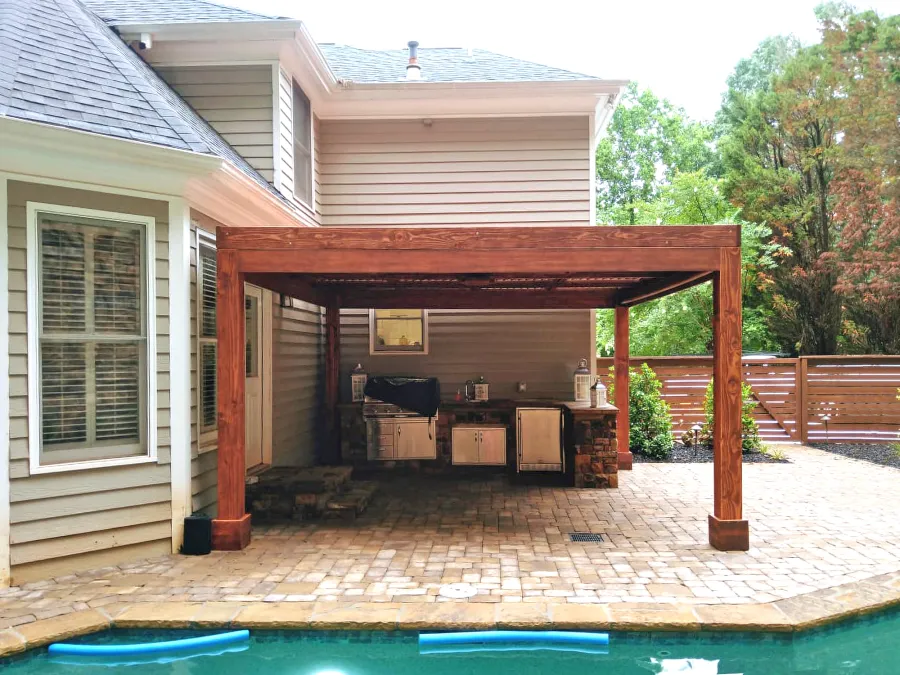 Modern Louvered Garden Pergola (Options: 15' L x 15' W, 8'' x 8'' Posts, Mobile Louvers, Douglas-fir, 9 ft H, 1 Electrical Wiring Trim, 2 Curtain Rods, 4 Post Anchor Kit for Concrete, No Post Decorative Trims, 1 Ceiling Fan Base, Coffee-Stain Premium Sealant). Photo Courtesy of J. Mcknight of Smyrna, Georgia.