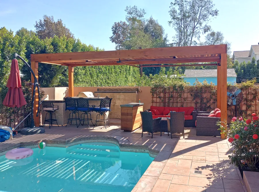 Modern Louvered Garden Pergola (Options: 25' L x 10' W, 8'' x 8'' Posts, Mobile Louvers, Douglas-fir, No Privacy Wall, Electrical Wiring Trim for 2 Posts, Without Fascia, 4 Curtain Rods, 4 Post Anchor Kit for Concrete, No Post Decorative Trims, 2 Ceiling Fan Bases, Transparent Premium Sealant). Photo Courtesy of B. Hamideh of Studio City, CA.