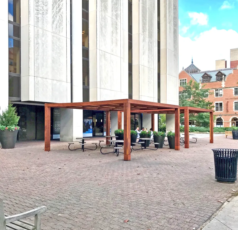 Modern Louvered Garden Pergolas (Options: 20' L x 20' W, 10'' x 10'' Posts [Anchor System for 8X8 Posts with Trim Pieces Flush for 10X10 Posts], Fixed, California Redwood, 9 ft H, No Electrical Wiring Trims, 4 Post Anchor Kit for Concrete, No Post Decorative Trims, No Ceiling Fan Base, Transparent Premium Sealant). Photo Courtesy of the University of Chicago.
