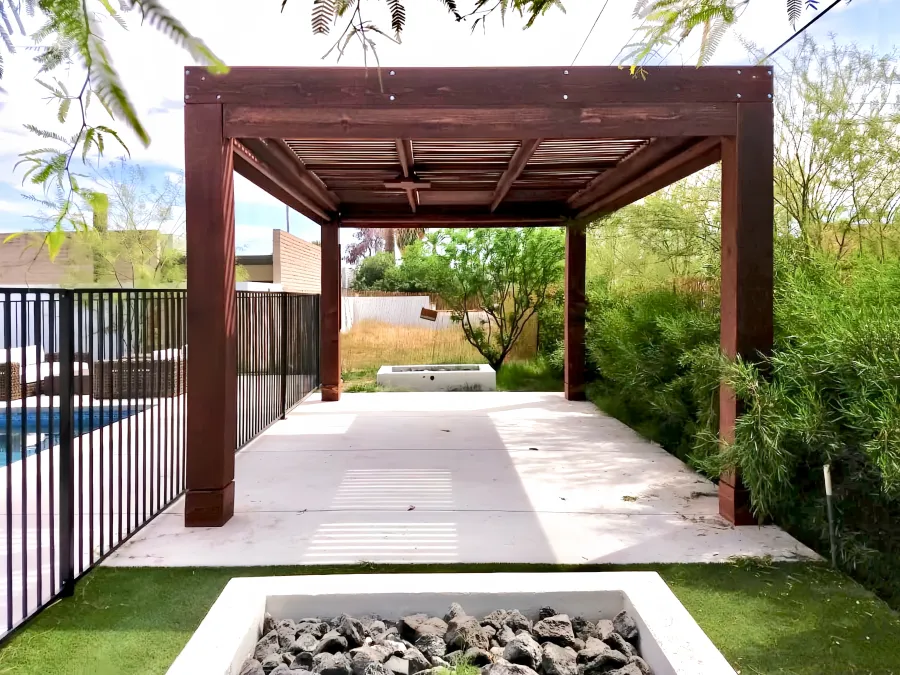 Modern Louvered Garden Pergola (Options: 18' L x 12' W, 10'' x 10'' Posts, Mobile Louvers, California Redwood, 9.5 ft H, 1 Electrical Wiring Trim, 2 Curtain Rods, 4 Post Anchor Kit for Concrete [Seamless by Custom Request], No Post Decorative Trims, 1 Ceiling Fan Base, Coffee-Stain Premium Sealant). Photo Courtesy of G. Hewson of Phoenix, Arizona.
