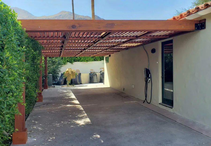 Custom Attached Modern Louvered Garden Pergola (Options: 34' L x 14' W, 8'' x 8'' Posts, Mobile Louvers, Mature Redwood, No Electrical Wiring Trim, Without Fascia, No Curtain Rods, 3 Post Anchor Kit for Concrete, No Post Decorative Trims, No Ceiling Fan Base, Transparent Premium Sealant). Photo Courtesy of G. Richter of Palm Springs, CA.