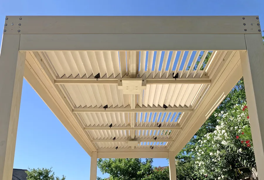 Custom Modern Louvered Garden Pergola (Options: 20' L x 10' W, 8'' x 8'' Posts, Mobile Louvers, Douglas-fir, 8.5 ft H, 1 Electrical Wiring Trim, No Curtain Rods, 4 Post Anchor Kit for Concrete, 2 Ceiling Fan Bases, White Stain Premium Sealant). Photo Courtesy of G. Rodriguez of Cypress, TX.