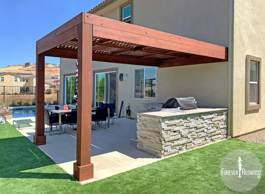 Modern Louvered Garden Pergola (Options: 16' L x 10' W, 8" x 8" Posts, Mobile Louvers, California Redwood, 9.5 ft H, 1 Electrical Wiring Trim, No Curtain Rods, 2 Post Anchor Kit for Concrete, Attached to Wall by Custom Request, No Post Decorative Trims, 1 Ceiling Fan Base, Coffee Stain Premium Sealant). Photo Courtesy of J. Murphy of Eldorado Hills, California.