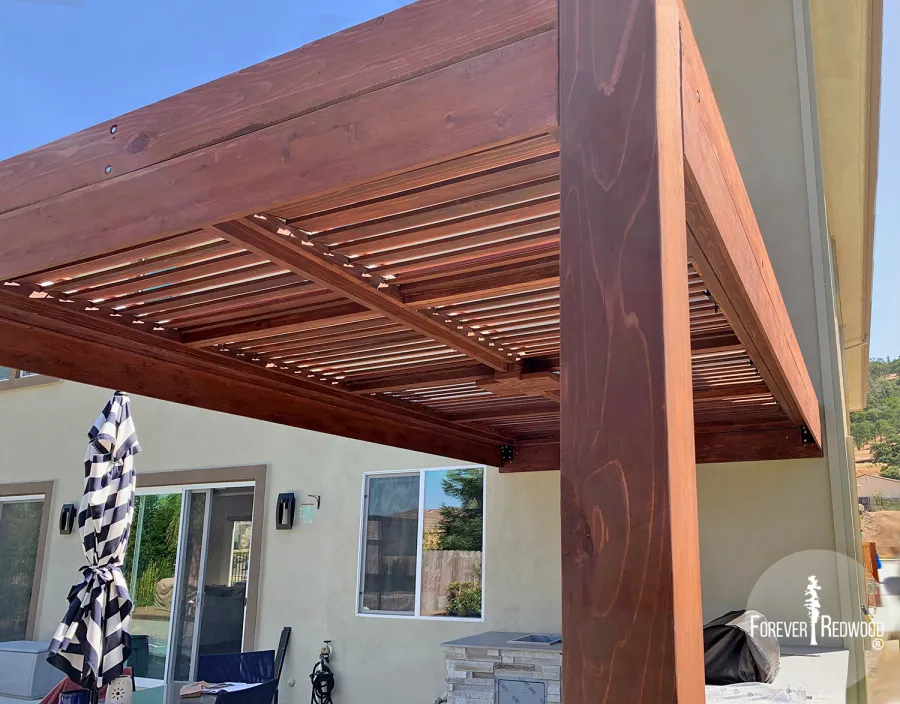 Modern Louvered Garden Pergola (Options: 16' L x 10' W, 8" x 8" Posts, Mobile Louvers, California Redwood, 9.5 ft H, 1 Electrical Wiring Trim, No Curtain Rods, 2 Post Anchor Kit for Concrete, Attached to Wall by Custom Request, No Post Decorative Trims, 1 Ceiling Fan Base, Coffee Stain Premium Sealant). Photo Courtesy of J. Murphy of Eldorado Hills, California.