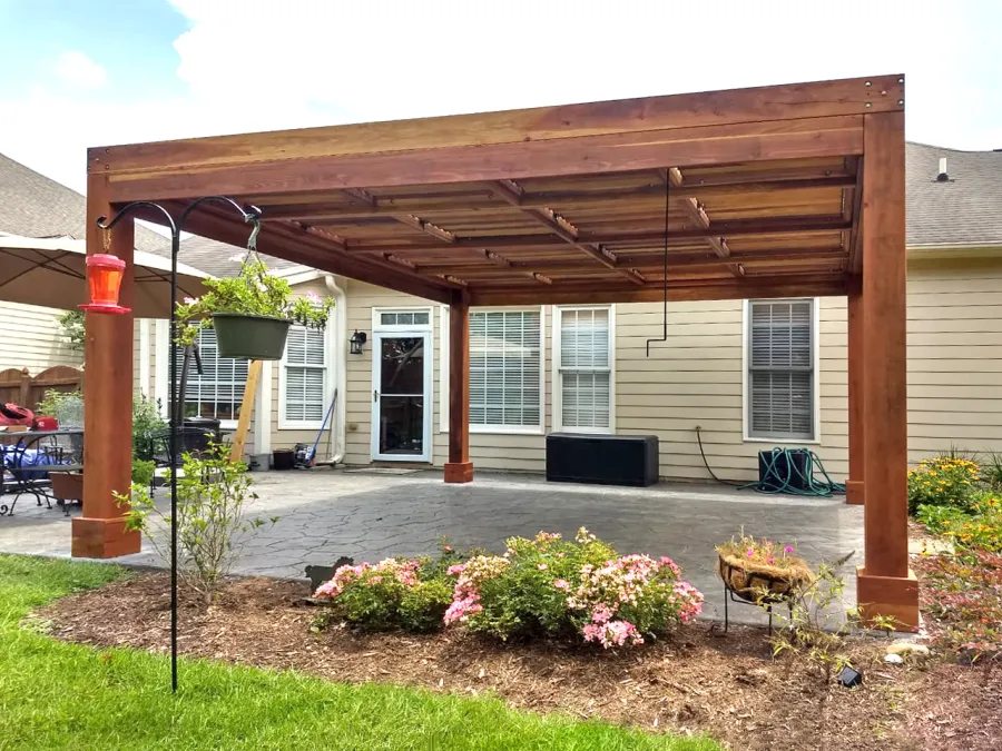 Modern Louvered Garden Pergola (Options: 16' L x 16' W, 8'' x 8'' Posts, Mobile Louvers, California Redwood, 9 ft H, No Electrical Wiring Trim, No Curtain Rods, 4 Post Anchor Kit for Concrete, No Post Decorative Trims, No Ceiling Fan Base, Transparent Premium Sealant). Photo Courtesy of J. McLaughlin of Cary, North Carolina.